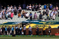 MELBOURNE, AUSTRALIA - DECEMBER 26: Officials and fans are seen standing for the national anthems during day one of the Second Vodafone Test cricket match between Australia and India at the Melbourne Cricket Ground on December 26, 2020 in Melbourne, Australia. (Photo by Dave Hewison/Speed Media/Icon Sportswire)