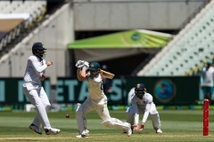 MELBOURNE, AUSTRALIA - DECEMBER 26: Travis Head of Australia bats during day one of the Second Vodafone Test cricket match between Australia and India at the Melbourne Cricket Ground on December 26, 2020 in Melbourne, Australia. (Photo by Dave Hewison/Speed Media/Icon Sportswire)