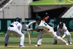 MELBOURNE, AUSTRALIA - DECEMBER 26: Travis Head of Australia bats during day one of the Second Vodafone Test cricket match between Australia and India at the Melbourne Cricket Ground on December 26, 2020 in Melbourne, Australia. (Photo by Dave Hewison/Speed Media/Icon Sportswire)