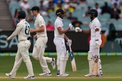 MELBOURNE, AUSTRALIA - DECEMBER 27: Indian batsman touch fists during day two of the Second Vodafone Test cricket match between Australia and India at the Melbourne Cricket Ground on December 27, 2020 in Melbourne, Australia. (Photo by Dave Hewison/Speed Media/Icon Sportswire)