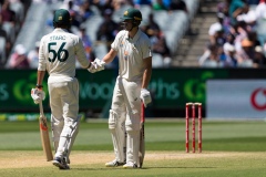 MELBOURNE, AUSTRALIA - DECEMBER 29: Mitchell Starc of Australia and Cameron Green of Australia bump fists during day four of the Second Vodafone Test cricket match between Australia and India at the Melbourne Cricket Ground on December 29, 2020 in Melbourne, Australia. (Photo by Dave Hewison/Speed Media/Icon Sportswire)