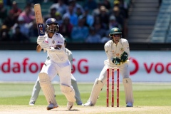 MELBOURNE, AUSTRALIA - DECEMBER 29: Tim Paine of Australia (r) as Ajinkya Rahane of India takes a run during day four of the Second Vodafone Test cricket match between Australia and India at the Melbourne Cricket Ground on December 29, 2020 in Melbourne, Australia. (Photo by Dave Hewison/Speed Media/Icon Sportswire)