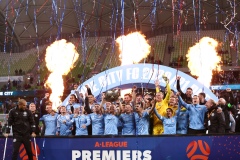 MELBOURNE, AUSTRALIA - MAY 22: Scott Jamieson of Melbourne City holds up the premiership plate as he and his team mates cheers amid fireworks and ribbons during the Hyundai A-League soccer match between Melbourne City FC and Central Coast Mariners on May 22, 2021 at AAMI Park in Melbourne, Australia. (Photo by Speed Media/Icon Sportswire)
